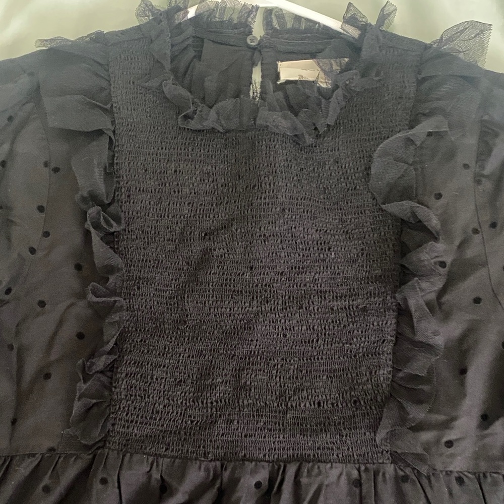 THE GREAT. Black Swiss Dot Ruffle-Neck Long Sleeve Blouse